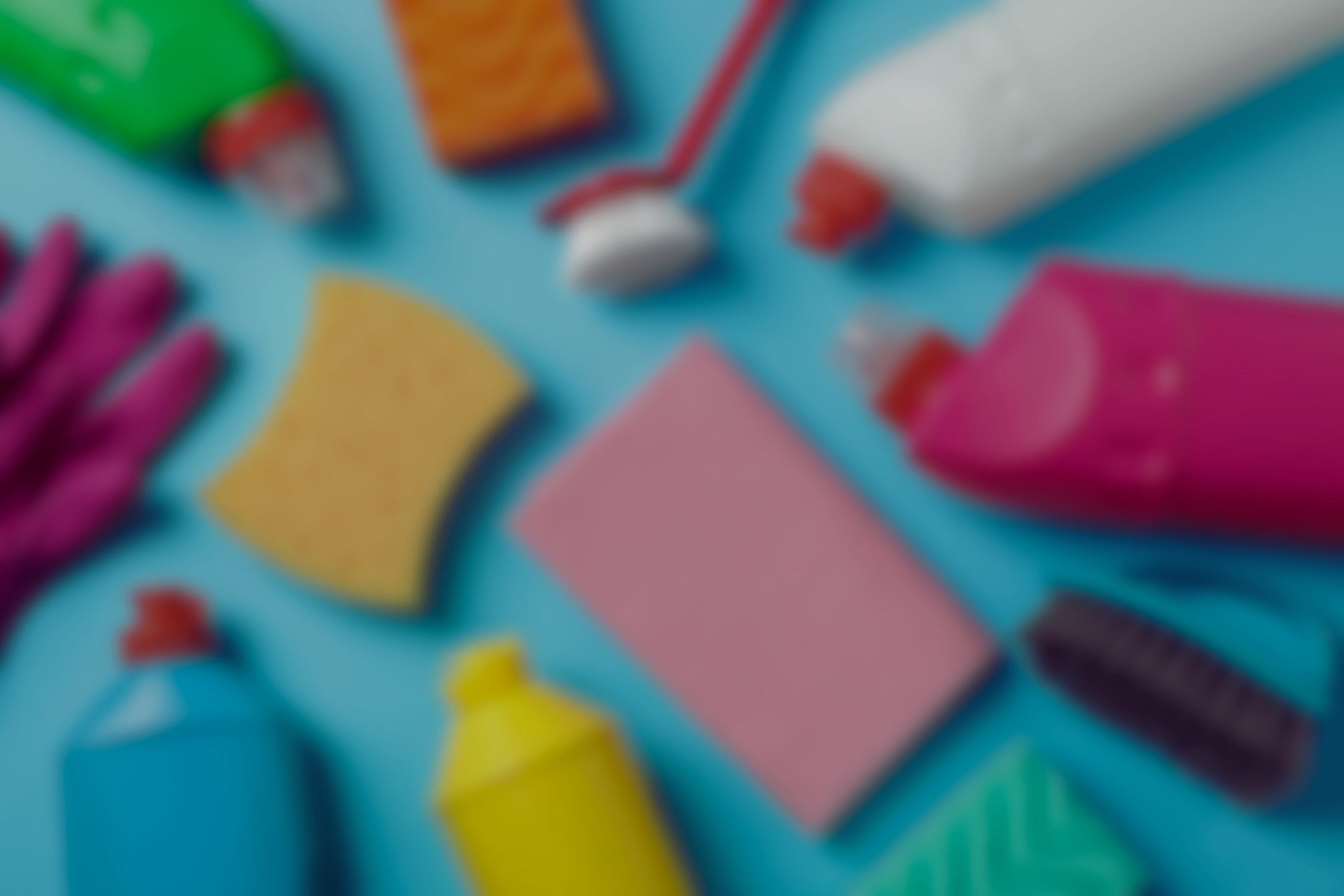 Detergents and Cleaning Supplies on Blue Background, Top View